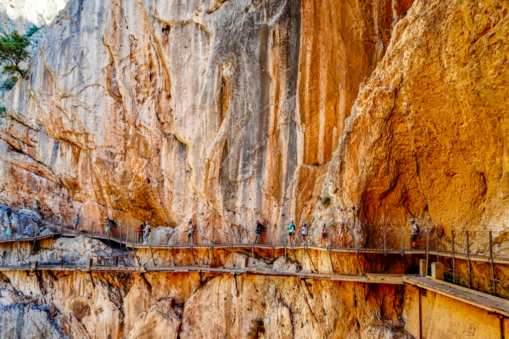 A narrow path for hikers along a rockface along the Caminito del Rey